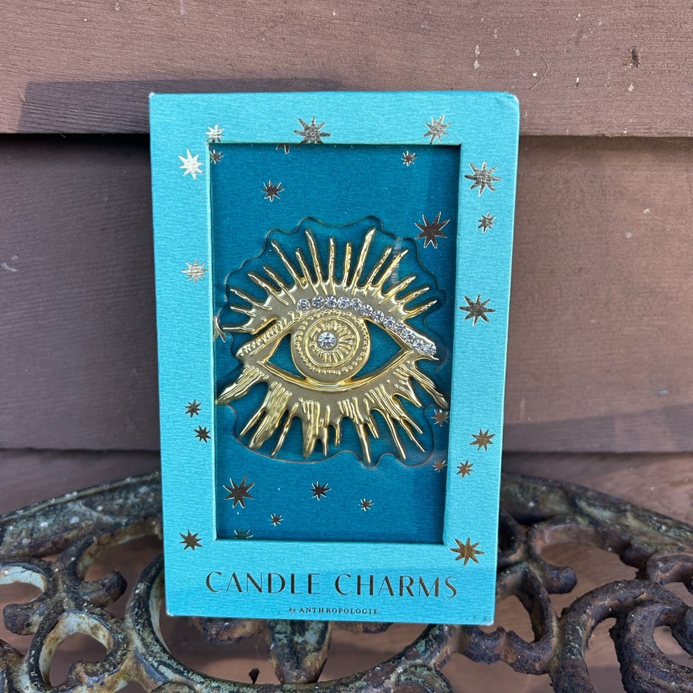 Anthropologie Gold Eye Candle Charm